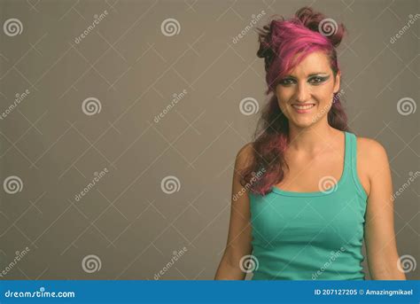 Beautiful Woman With Pink Hair And Make Up Against Gray Background Stock Image Image Of Gray