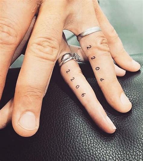 Ring Finger Name Tattoos