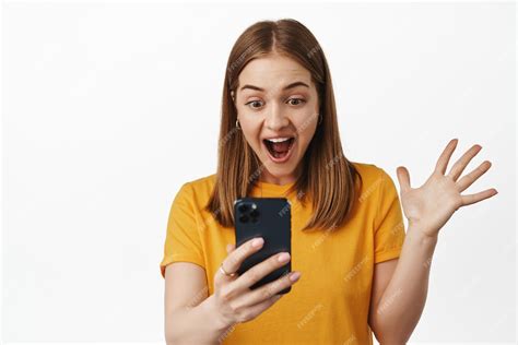 Free Photo Image Of Surprised Happy Woman Gasp Reading Smartphone