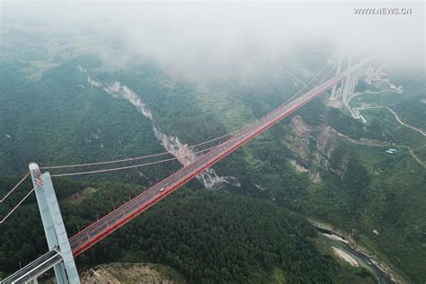 Fog Shrouded Qingshuihe Bridge In Southwest Chinas Guizhou Cn