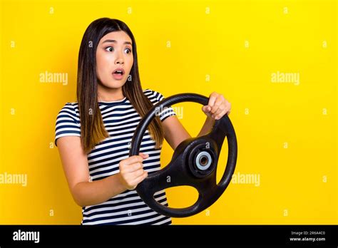 Photo Of Young Scared Funny Japanese Girl Hold Steering Wheel Scared