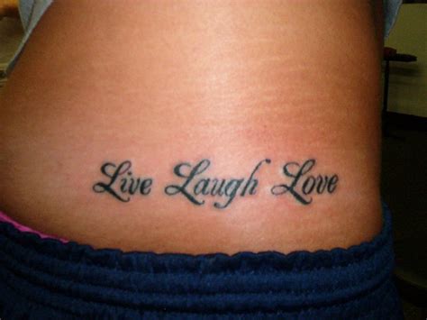 There is something attractive about a pair of tattoos that equate love and life in such artistic fonts. Live Laugh Love Tattoo Picture