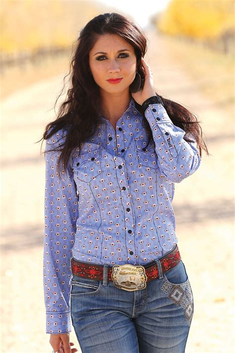 this cute country button up will have everyone staring as timeless western wear is paired with