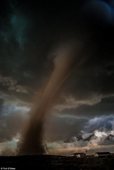 denver couple takes epic prom photo with massive tornado in the