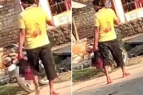 Shocking Moment Evil Husband Carries Wifes Severed Head Down Street To