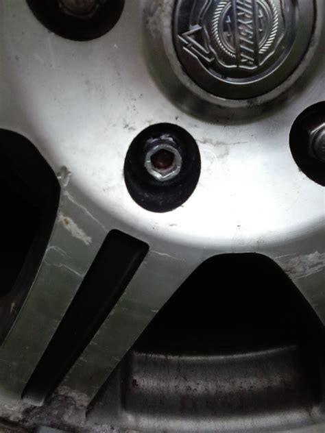 The bumper had 3 bolts coming out on each side of the mounts, and one nut for bottom line, how do you tighten a bolt into a stripped nut! How to Remove a Stuck or Stripped Lug Nut | AxleAddict
