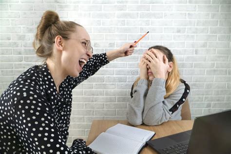 A Conflict Situation Between A Teenager And A Teacher In The Classroom