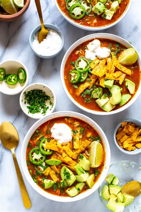 This tortilla soup is similar to chili but with a little south of the border flair. Crockpot Chicken Tortilla Soup - The Girl on Bloor