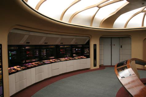 The Inside Of A Building With Several Machines In Its Display Cases
