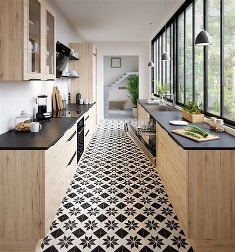 Un carrelage sol en carreaux de ciment noir et blanc avec des lignes droites pour un salon moderne tendance. Carreaux de ciment : tout savoir pour bien choisir sa déco