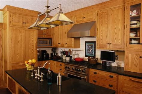 Best hardware for oak cabinets. i love this, i think this grain and stain match ours, and ...