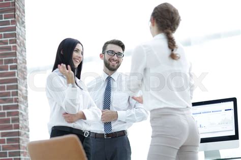Company Employees Are Talking In The Office Stock Image Colourbox