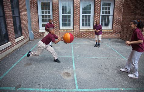 Four square is played with a rubber playground ball on a square court with four players, each occupying a quarter of the court. Game of the Month: Foursquare Categories | Playworks