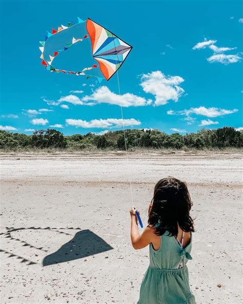 Kite Flying With Kids How To Choose Launch Fly And Land A Kite