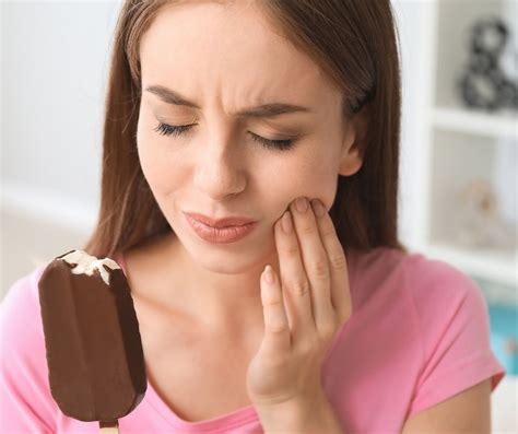 understanding tooth sensitivity causes symptoms and treatments