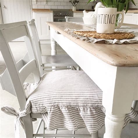 Sporting a solid hue, this slipcover blends effortlessly with your decor, while its skirted bottom and bow tieback complete the look with a tailored touch. Dining Chair Covers / Linen Chair Cover / Slipcover ...
