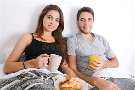 Couple Having Breakfast In Bed Stock Image Image Of Lying Bedroom