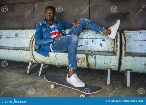 Young Handsome And Attractive Black African American Skateboarder Man