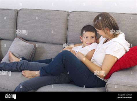 Mother And Son Relaxing Together On Sofa Stock Photo Alamy