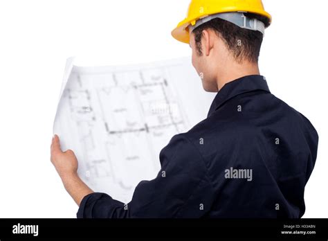Engineer Reviewing Blueprint Stock Photo Alamy