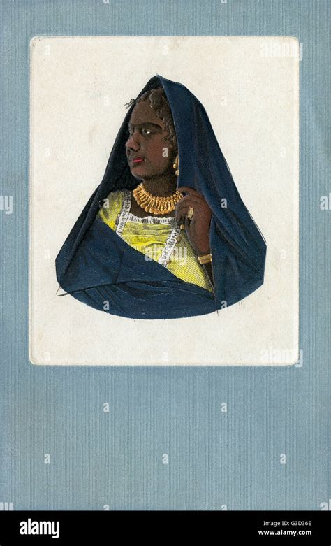 Egyptian Lady Wearing A Dark Blue Veil And Adorned With Elaborate Golden Jewellery Denoting