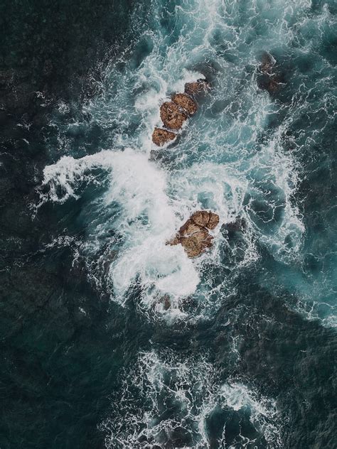 Sea Rocks Aerial View Waves Water Hd Phone Wallpaper Peakpx