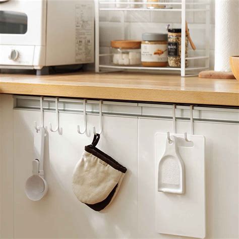 In the kitchen, these little guys help keep your sink area clear of clutter. Cabinet Hanging Hooks (2pc Set) | Kitchen & Bathroom ...