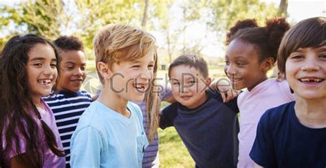 Multi Ethnic Group Of Schoolchildren On School Trip Smiling Stock
