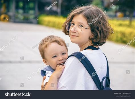 7870 Teenage Girl Holding Baby Images Stock Photos And Vectors