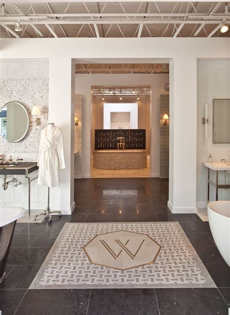 Bathrooms have very specific design constraints, and today's featured designer brings a wealth of interior design experience to teach us about styling a chic and functional bathroom space. Logo in Floor! | Bathroom showrooms, House design kitchen ...