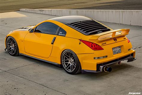 The enthusiast, the touring and the grand touring. Sunflower Yellow Nissan 350Z NISMO Rocking Forgestar F14 ...