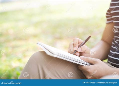 Students Take Notes In Notebooks At The Park Stock Photo Image Of