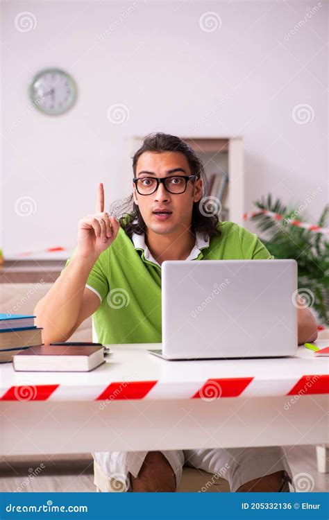 Young Male Student Studying At Home In Self Isolation Concept Stock