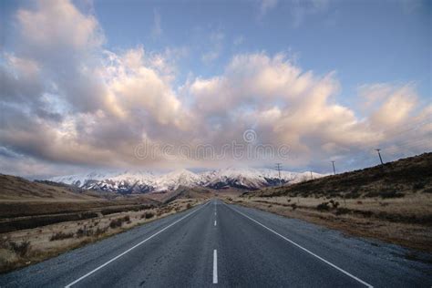 Most Beautiful Road To Snow Mountain In New Zealand During Sunset