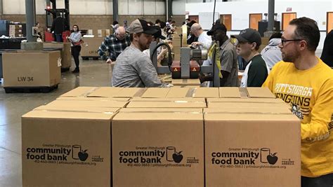 We will strive to meet the most pressing needs of as many. Greater Pittsburgh Community Food Bank holding food ...