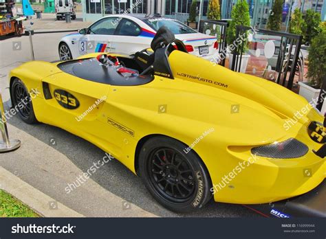 Montreal Ca June 09 Yellow Porsche 33 Sport Race Car At A Car