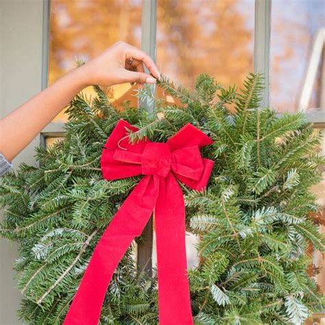 How To Hang A Wreath Without Making Holes In The Door How To Hang A