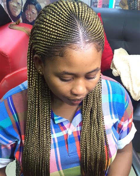 Updo with braids and bangs hairstyle. 21 Latest Hairstyle for Ladies in Nigeria 2020