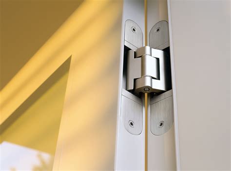Also know, how do you install hidden door hinges? Simonswerk Tectus Concealed Hinges | Door fittings ...