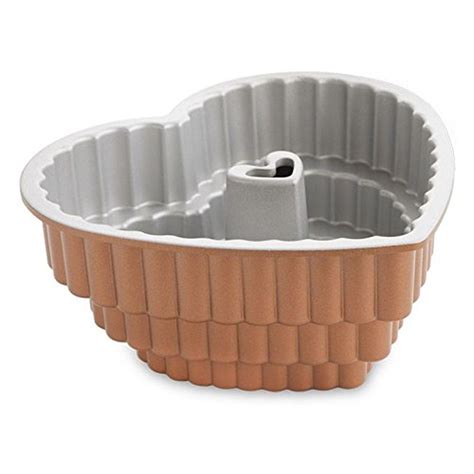 I spray the pan really really well until there's like a thick layer. Nordic Ware 89937 Cast Bakeware Tiered Heart Bundt, Bronze ...