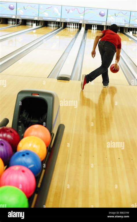 Man Bowling In Bowling Alley Stock Photo Alamy