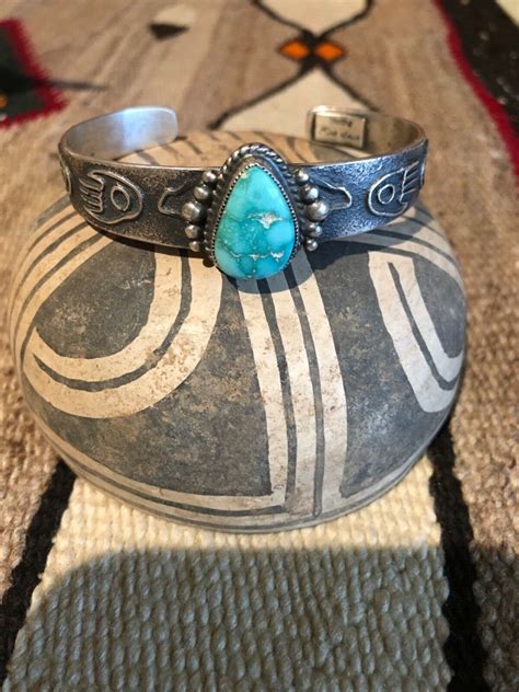 Kirk Smith Native American Sand Cast Cuff With Turquo Gem