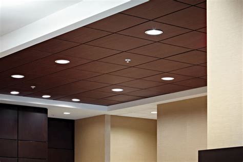 This type of suspended ceiling hides the grid system using acoustical tiles. Wooden suspended ceiling - PLANOSTILE™ - CHICAGO METALLIC ...