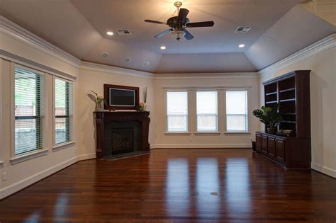 The Spacious Living Room Features Raised Ceilings Surround Sound