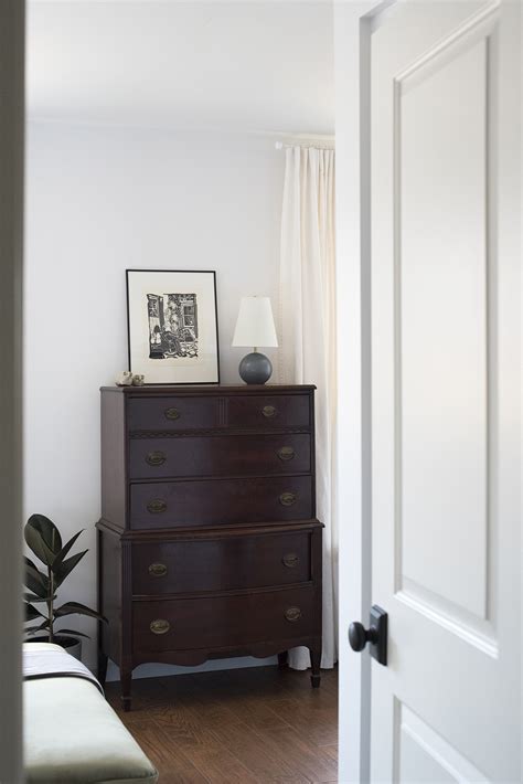 Dressers usually have a coordinating dresser mirror secured on top. Tall Vintage Dresser in Bedroom - Room For Tuesday