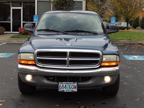 Illuminated entry, vehicles equipped with power door locks. 2002 Dodge Dakota SLT V8 XTRA CAB 2WD CANOPY 97K MILES PICKUP
