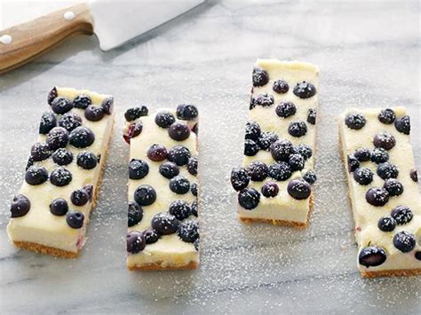 Add eggs and yolks, one at a time, beating just until. Lemon Blueberry Cheesecake Bars Recipe | Tyler Florence ...