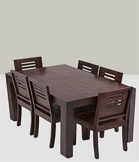 Our 4 seater wooden dining table sets are just the thing you need. Anant Dining Set 6 Seater with Table - Buy Anant Dining ...