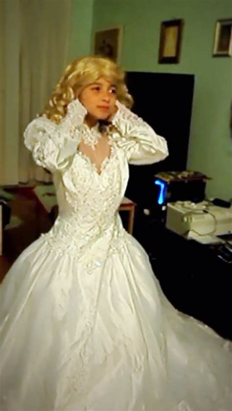 I laid it on my white comforter and they are virtually the same color. Do it and get to wear a wedding dress??!!! Where do I sign ...