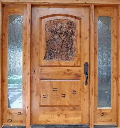 Wholesale direct · call for a free quote · over 1m+ doors in stock! Knotty Alder Entrance with Hand Carved Door - Front Doors ...